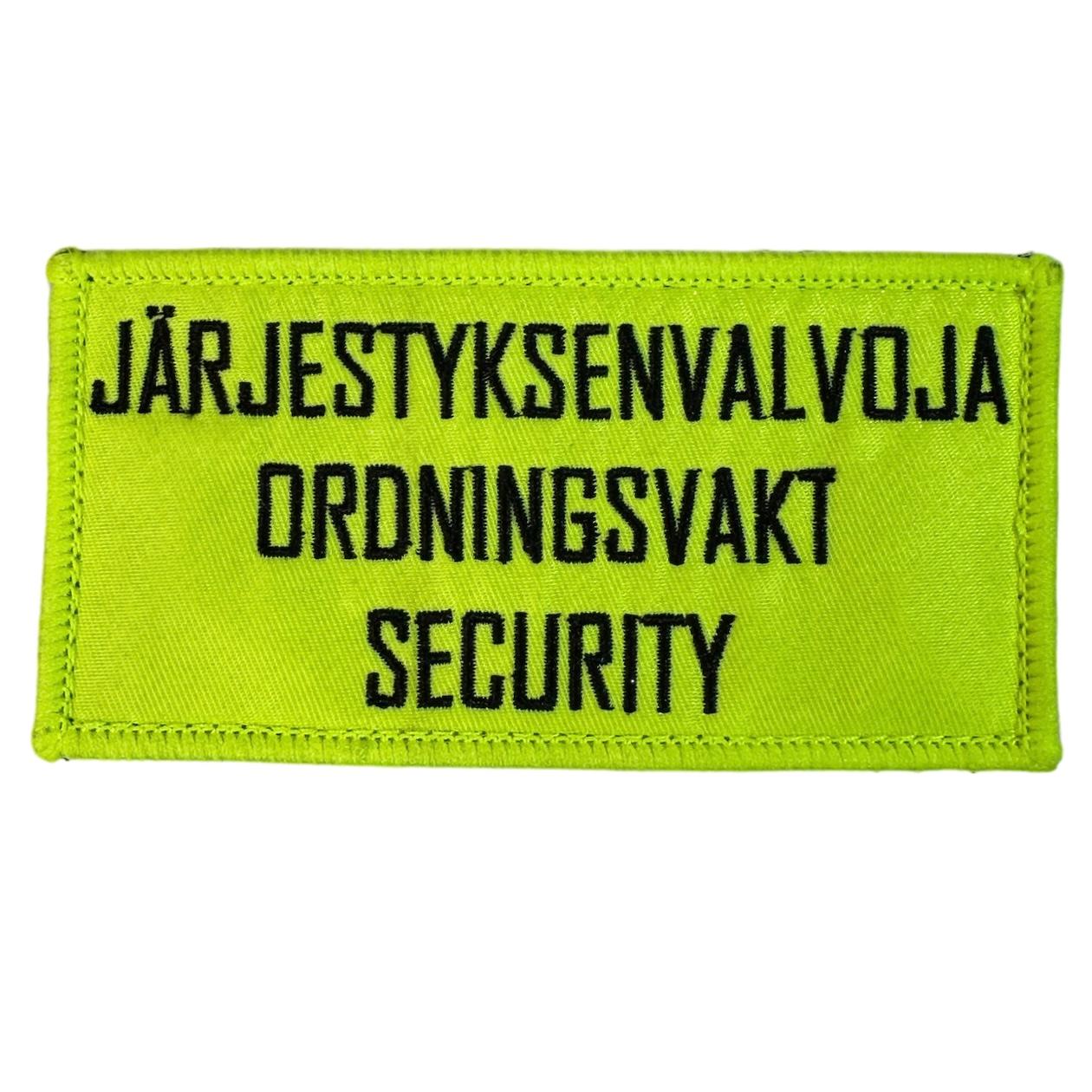 Järjestyksenvalvojan kangasmerkki rintaan 45 x 90 mm